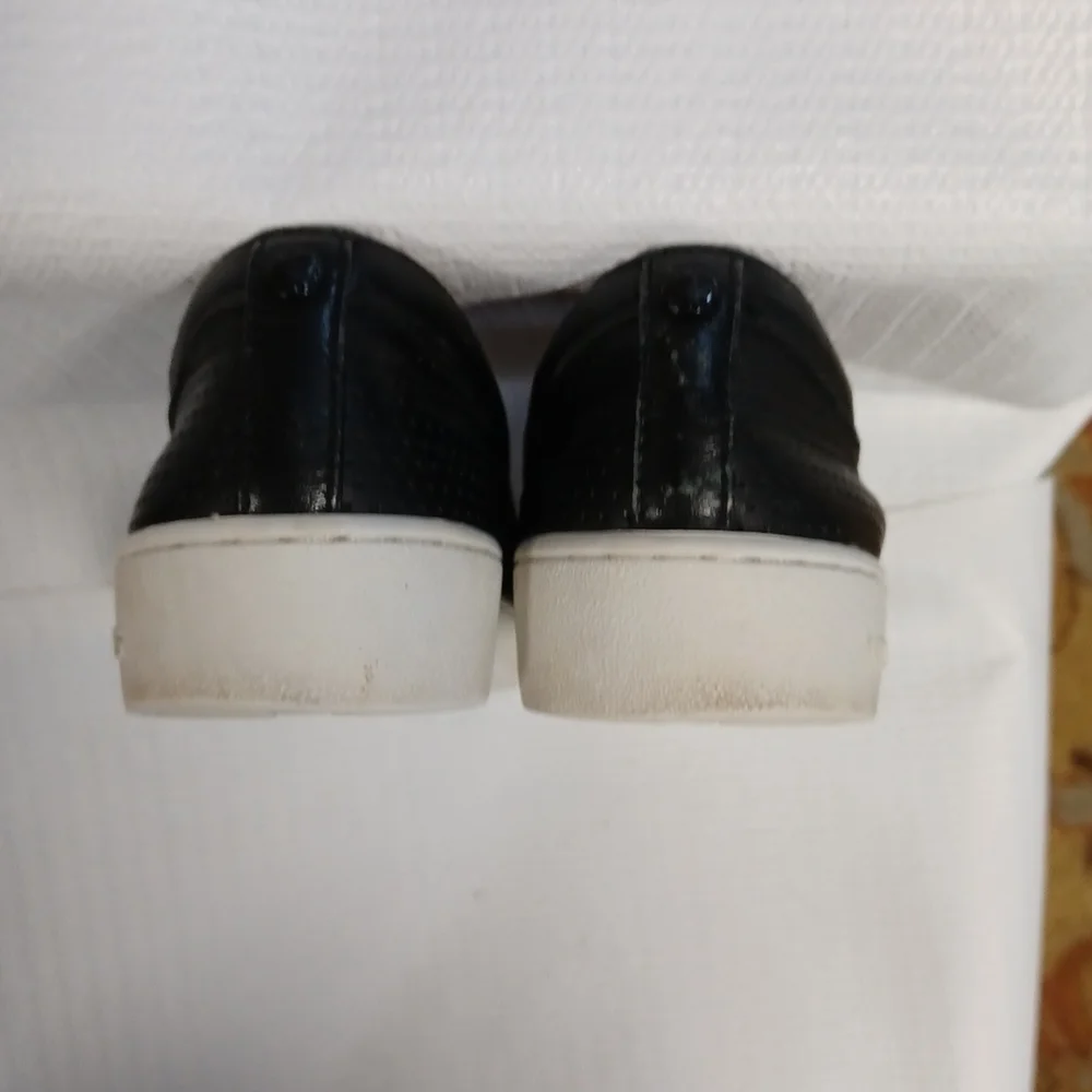 Michael Kors slip-on perforated black leather S 5M great condition